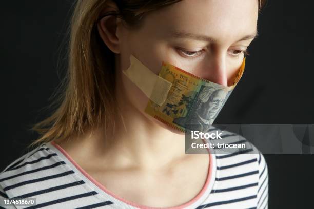 Money Buys Silence Womans Mouth Covered With Australian Dollar Bill Corruption And Freedom Of Speech Concept Stock Photo - Download Image Now