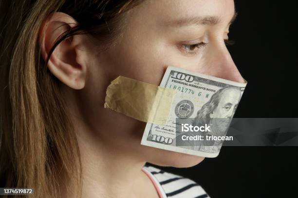 Money Buys Silence Womans Mouth Covered With Dollar Bill Corruption And Freedom Of Speech Concept Stock Photo - Download Image Now