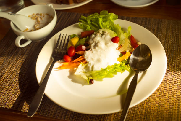 Arugula salad with colorful cherry tomatoes, creating a vibrant and healthy dish