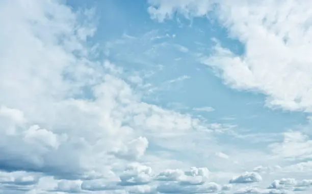 Photo of Soft white clouds against blue sky background