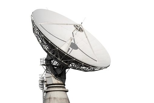 A closeup aerial photograph of Jodrell Bank, Cheshire, England. The photograph was produced on a bright autumn afternoon with clear blue skies. The photograph shows three radio telescopes of varying sizes at Jodrell Bank.