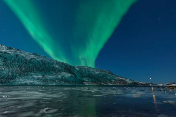 istock Aurora Northern Polar light in night sky over Northern Norway 1374567799
