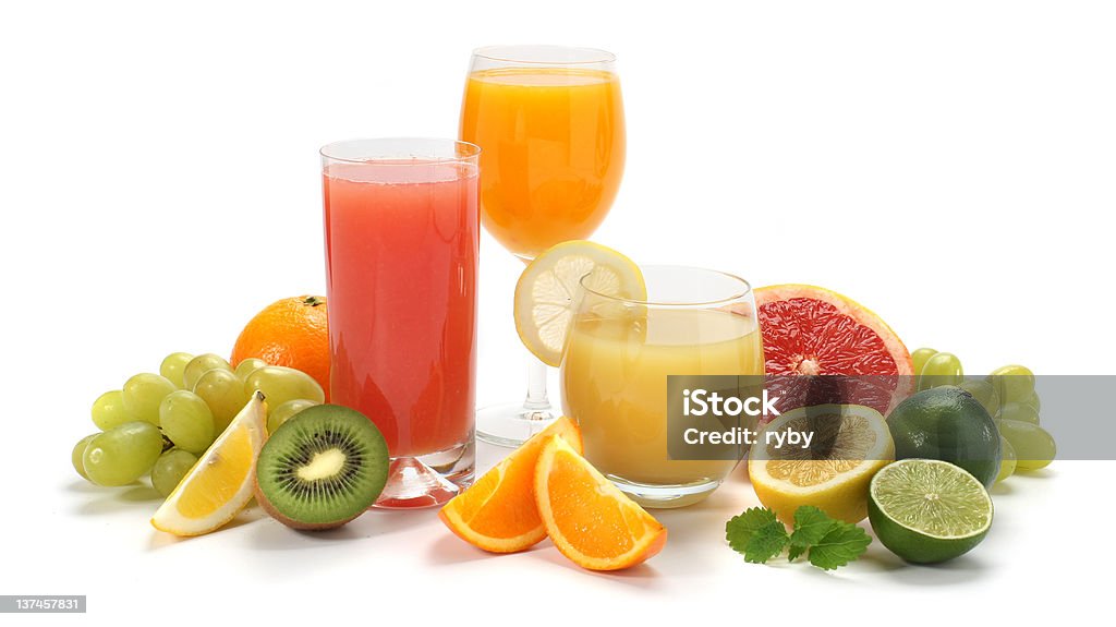 fruits and juice Glasses of fruit juice with fruits on a white background Breakfast Stock Photo