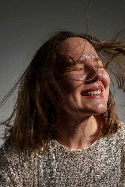 istock Happy smiling woman with sparkles 1374596268