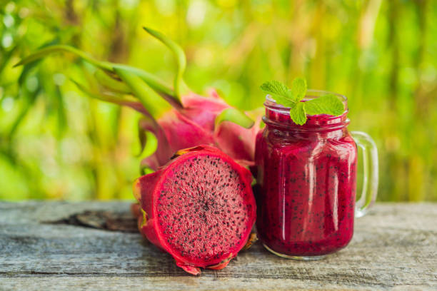 istock Dragon fruit smoothie on a wooden background 1374619979