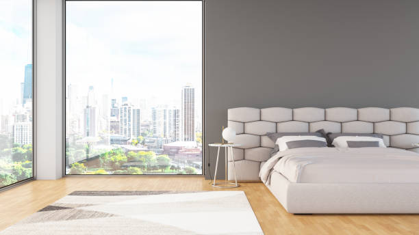 istock Modern Bedroom with Empty Wall and City View 1374620519