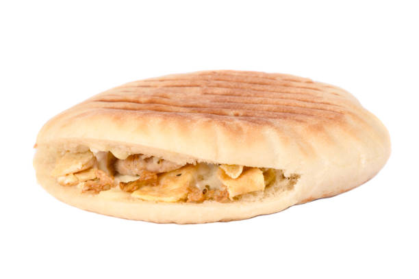 panini sandwich roast turkey with cheese and salad, tomato , lettuce isolated on white background