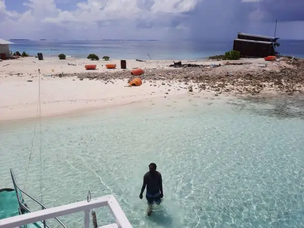 Photo of The Maldive's unseen beauty surrounded by the crystal clear seawater