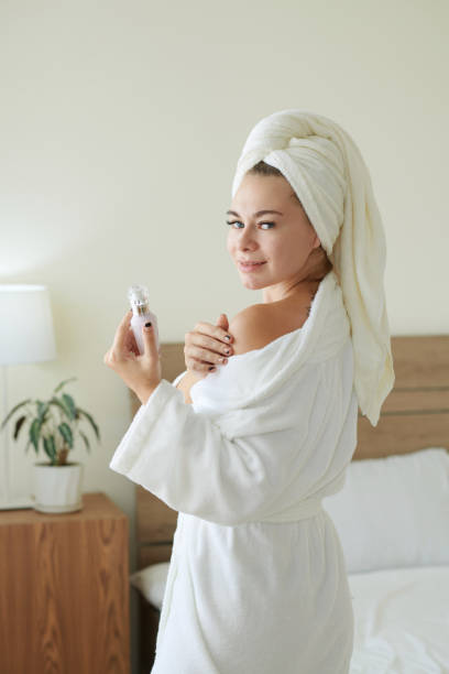 istock Woman Applying Enriched Body Lotion 1374647249