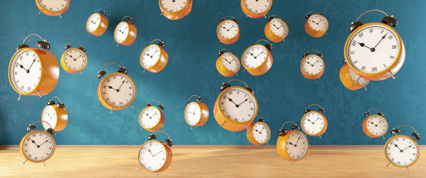 Alarm Clocks Floating in the Air stock photo