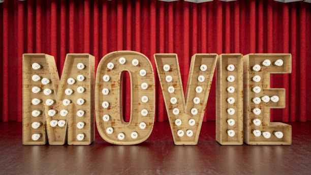 istock Light Bulb Movie Sign with Red Curtain as a Background 1374648981