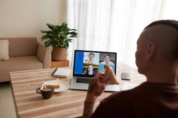 istock Man Having Online Meeting with Coworkers 1374652224