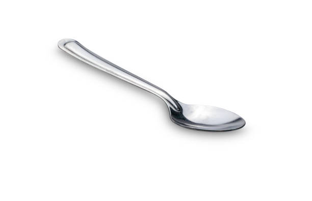 istock Silver spoon photo stacking side view isolated on white background. This has clipping path. 1374674183
