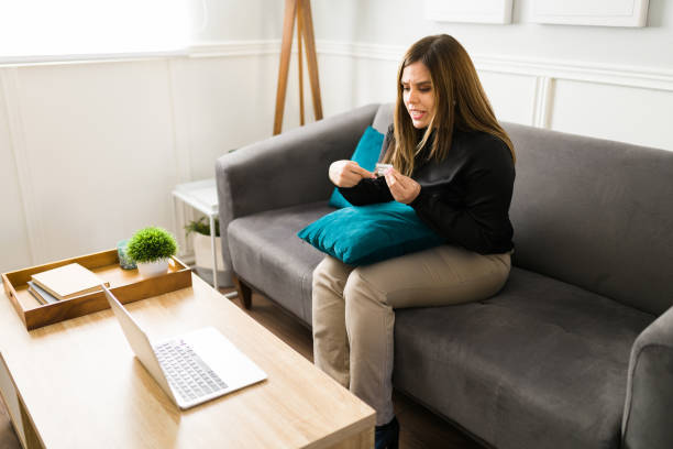 istock Troubled woman talking with a virtual doctor 1374683124