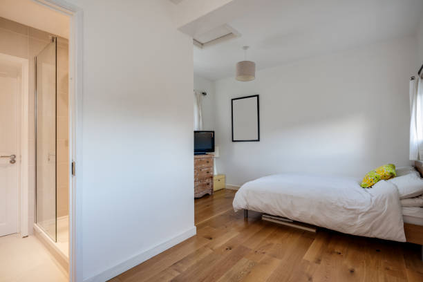 istock White Bedroom with oak flooring 1374692915