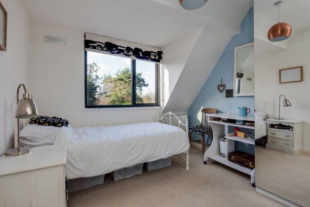 istock Bright white and blue bedroom 1374692917