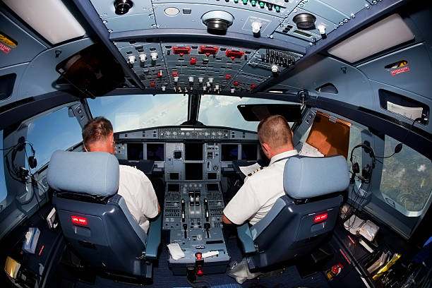 istock Pilots in the cockpit during a commercial flight 137469410