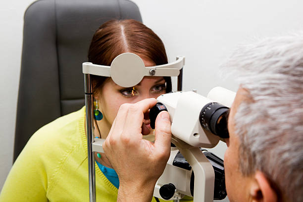 istock Young girl at the optometrist checking her vision 137470560
