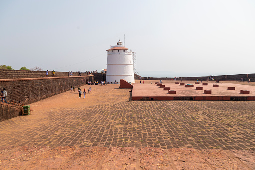 Aguada Fort,North Goa india February 21 2022.- Seventeenth-century Portuguese fort standing in Goa, India, on Sinquerim Beach