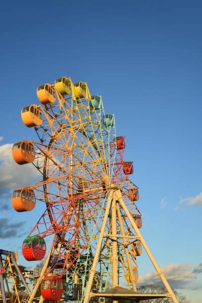 istock Ferris wheel with blue sky 1374761794