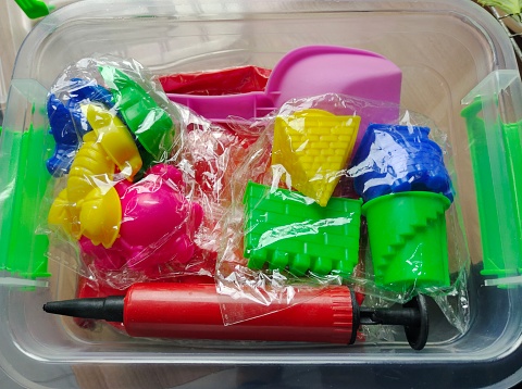 Set of Childrens Beach Toys and Colorful Plastic Mold in A Box.