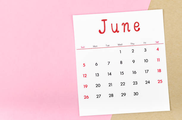 istock June 2022 calendar on pink background with empty space. 1374786514