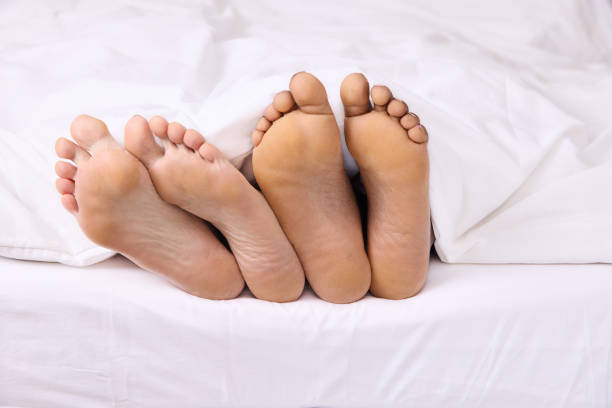istock Real feet with lesbian couple 1374787696
