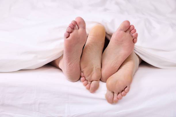 istock Real feet two women together 1374787804