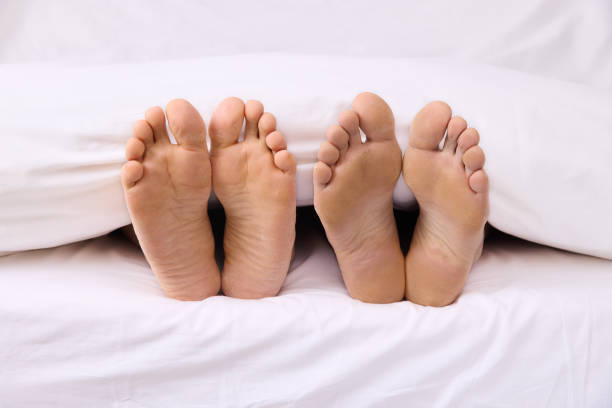 istock Real feet with lesbian couple 1374787870