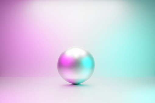 Shiny pearl on the pastel colored background with copy space