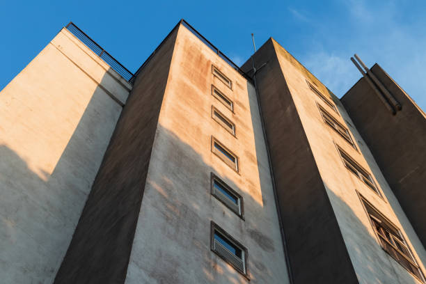 istock Abstract architecture background, walls with small windows 1374821957