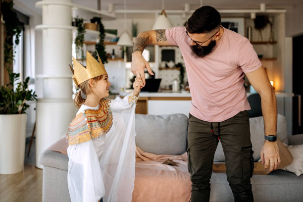 istock Father and daughter having fun times at home 1374823495