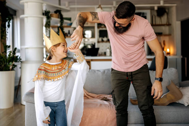 istock Father and daughter having fun times at home 1374823574