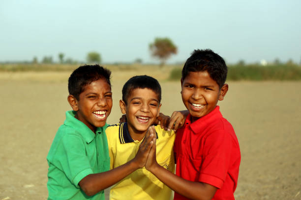 Indonesian Students In Uniform Playing Together Showing Friendship And Happiness