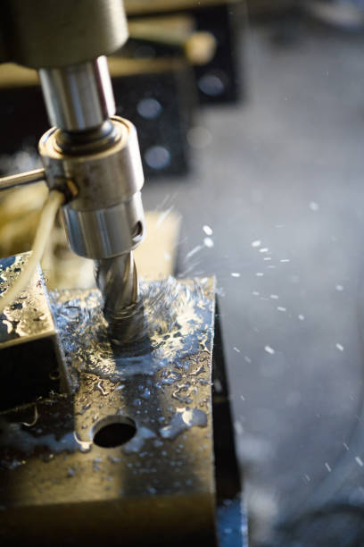 istock Metal Drill Press close-up with lubricant 1374853806