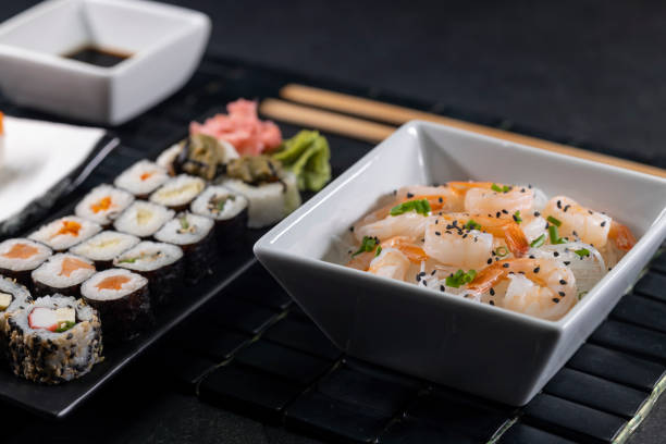 istock Various dishes of Asian cuisine with typical sushi 1374869440