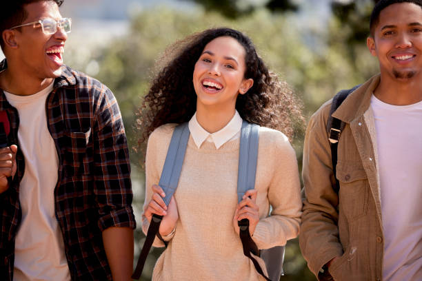 istock Shot of a group of students walking through campus together 1374875794