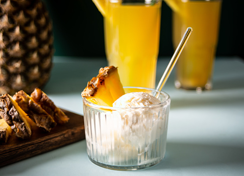 Delicious pineapple ice cream sorbet sundae. Summer food concept