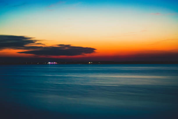 A reservoir of water when the sun is setting.