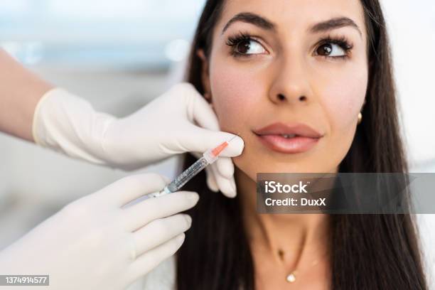 Modern Beauty Treatment Stock Photo - Download Image Now - Dermal Filler, Human Lips, Botulinum Toxin Injection