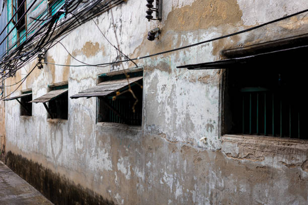 istock Side view of ancient building with classic windows in outdoor. 1374939705