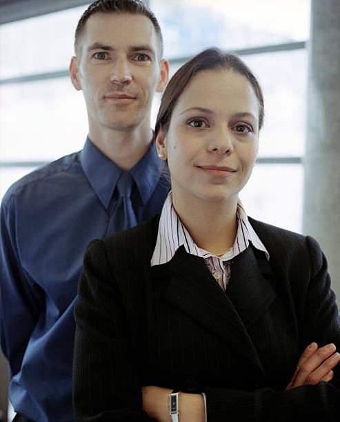 istock Business couple smiling to camera 137496782