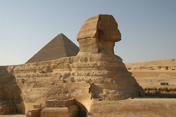 Sphinx and Pyramid at Giza, Egypt stock photo