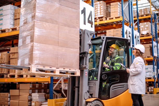 istock People working in pallet warehouse 1374993106
