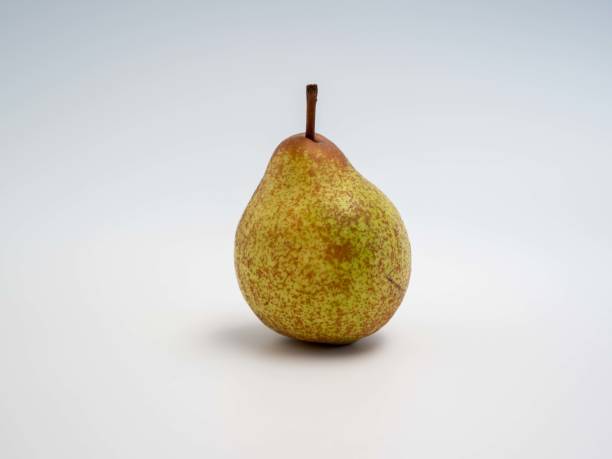 pear on a white background. fresh pear - prince of wales imagens e fotografias de stock