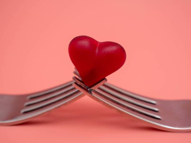 istock Banner. Heart on a fork close-up. Copy space for text 1375002513
