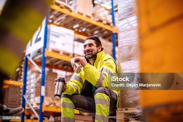 People Working In Pallet Warehouse Stock Photo - Download Image Now - Warehouse Worker, Pallet Jack, Driving