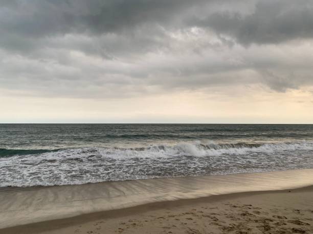 istock Cloudy with seascape and beach in tropical.Beach and sea with wave. 1375027199