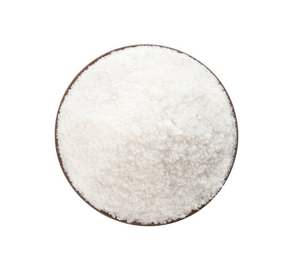 istock Bowl with natural salt isolated on white, top view 1375035421