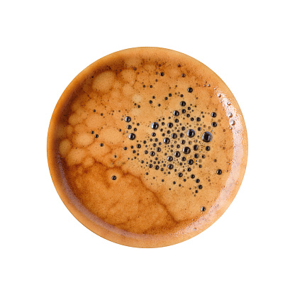 isolated circle of foam crema coffee texture macro background on white background, Close-up top view